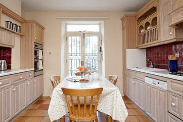 Traditional farmhouse style kitchen with breakfast area, well equipped with everything you will need