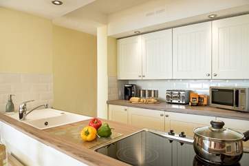 The kitchen is a delight to use and well-equipped.