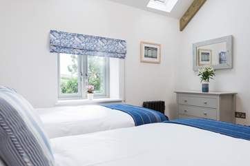 Bedroom two has countryside views.
