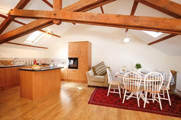The beautiful beams bring stunning characteristics to this pretty barn conversion