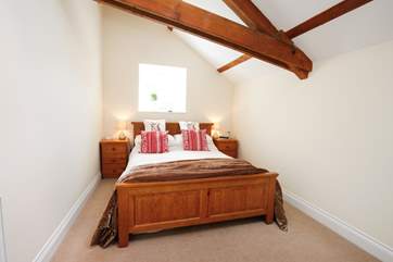 The master bedroom with lovely king-size bed