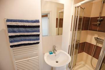 The shower-room off the single bedroom