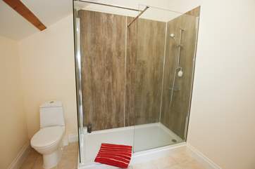 Enjoy your morning shower in this spacious shower off the master bedroom