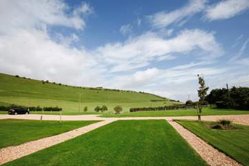 Beautiful and well manicured lawns with the countryside backdrop