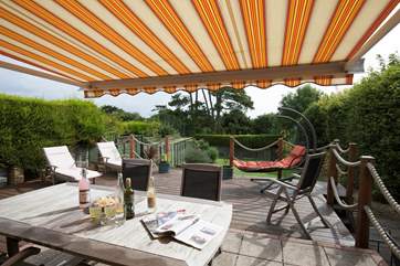 The awning in the garden is perfect for providing shade in the hot summer sunshine.