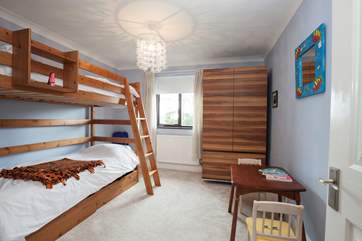 The third bedroom has bunk-beds ideal for children.