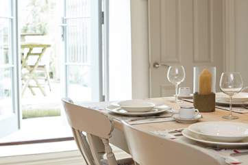 Open up the French doors and take two steps into the rear courtyard