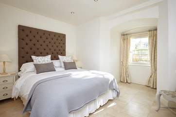 The master bedroom has a generous 5ft 6 king-size bed