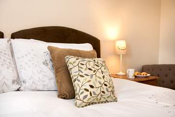 Of course there are pretty cushions on the bed making it feel very homely.