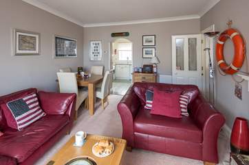 Inviting open plan sitting/dining-room.