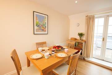 Open up the patio doors, let the fresh air come through as you have lunch at the table