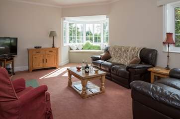 Escape to the window seat in the sitting-room with a good book for some quiet holiday time.