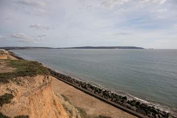 Looking east towards the Isle of Wight and the Needles, dogs are allowed on the beach all year.