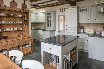 The kitchen offers plenty of space to whip up a feast.