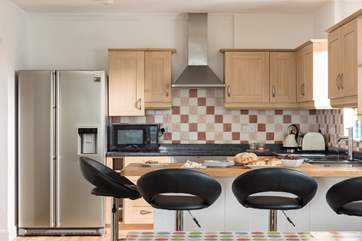 High stools at the breakfast-bar.