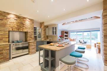 The spacious kitchen-area looking through to the dining-area.