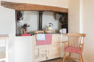As well as the hob and electric oven there is a traditional Aga, for lovely farmhouse cooking, additional warmth, or for sitting by with a book!