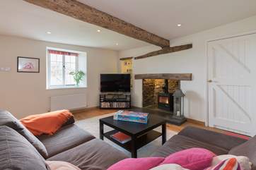 This is the snug in the main farmhouse, a lovely room away with large TV, a great library of DVDs and a wood-burning stove.