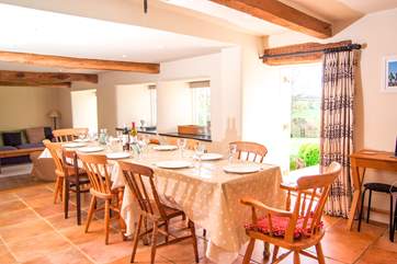 There is a wonderful farmhouse kitchen with a space for your whole party to eat together - same outside!