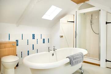 The family bathroom has a separate shower and gorgeous free-standing bath!