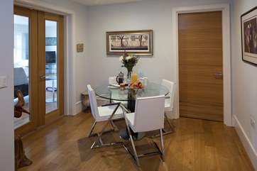 What a lovely use of this space. Close all doors and create the perfect dining area.