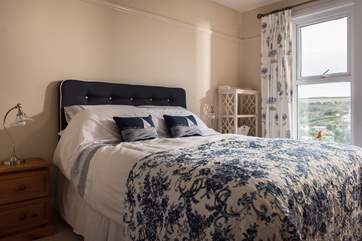 The bedroom has a 5' (king-size) bed.