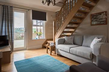The stairs lead up into the bedroom area (open to the living-room below).