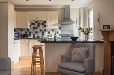 The kitchen-area is light and bright.