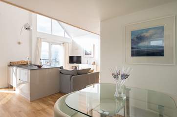 Looking back to the sitting and kitchen areas from the dining-area.