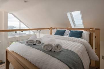 The mezzanine level is cosy with a double bed.