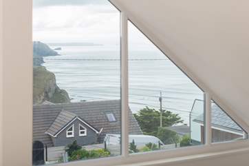 The view of the coastline from the mezzanine bedroom area at Ocean Retreat.