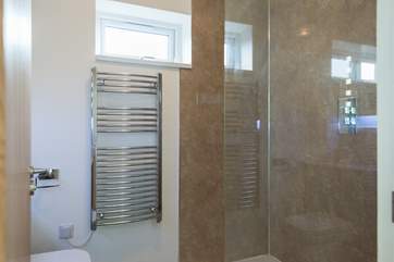 The spacious shower-room has a double size cubicle and power shower.