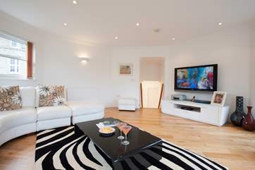 Put your feet up and relax with a film in peace as the kids have a living-room all to themselves downstairs.
