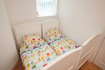 Snuggle the little ones down for a good night's sleep in an interlinking room off the master suite.