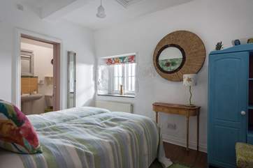 Bedroom two with views over the garden.