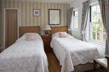 The light and airy twin room. Perfect for adults and children alike.