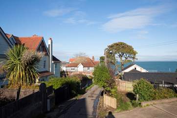 A few steps down the street to the white sands of Seagrove Bay.