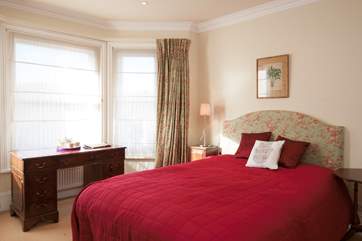 Another lovely spacious bedroom to the front of the house overlooking Fernlee Close, a quiet side road leading straight down to the beach.