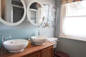 The en suite to the master bedroom with 'his and hers' sinks.