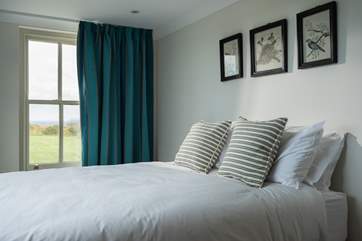 Bedroom 1 looks out over the garden.
