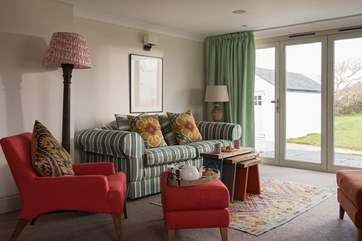 The big main living-room has two sitting-areas.