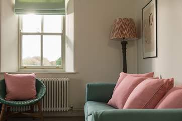 Lovely cushions and lamps throughout.