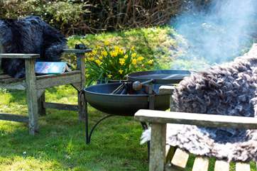 Cook up a scrummy supper on the fire-pit BBQ.