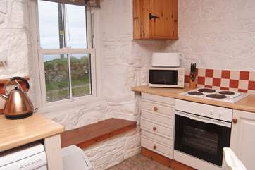 The kitchen-area has lovely sea views.