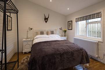 The master bedroom, Bedroom 1 has a super comfy 5 ft bed and en suite shower-room.