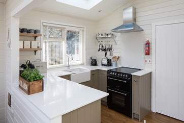 The bespoke kitchen is very well-equipped and has the bonus of a Nespresso machine.
