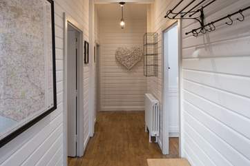 The hallway with the open plan space on the right and a huge OS map on the wall so that you can plan your adventures.