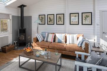 A wood-burner gives a cosy warmth on cooler evenings.