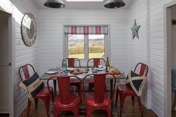 The dining-area looks out over the garden.