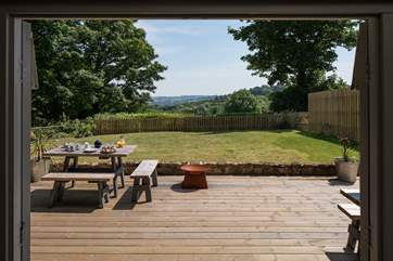 Fabulous views and French doors onto the deck, the fire pit has been removed.